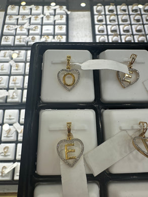 Diamond letter o pendant