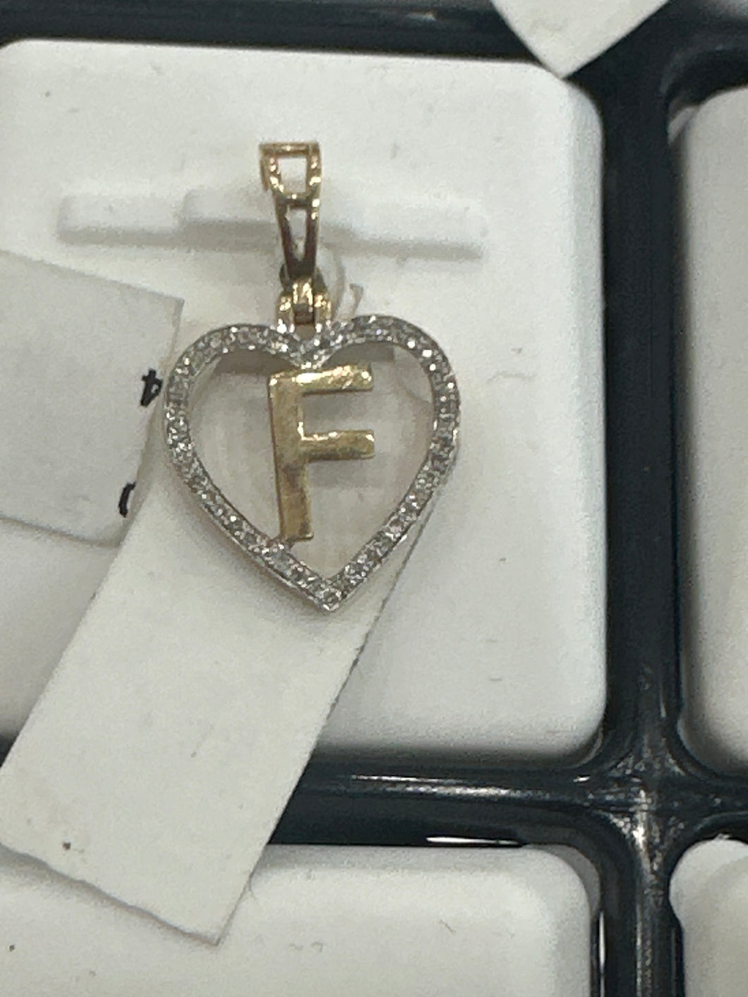 Diamond letter f pendant